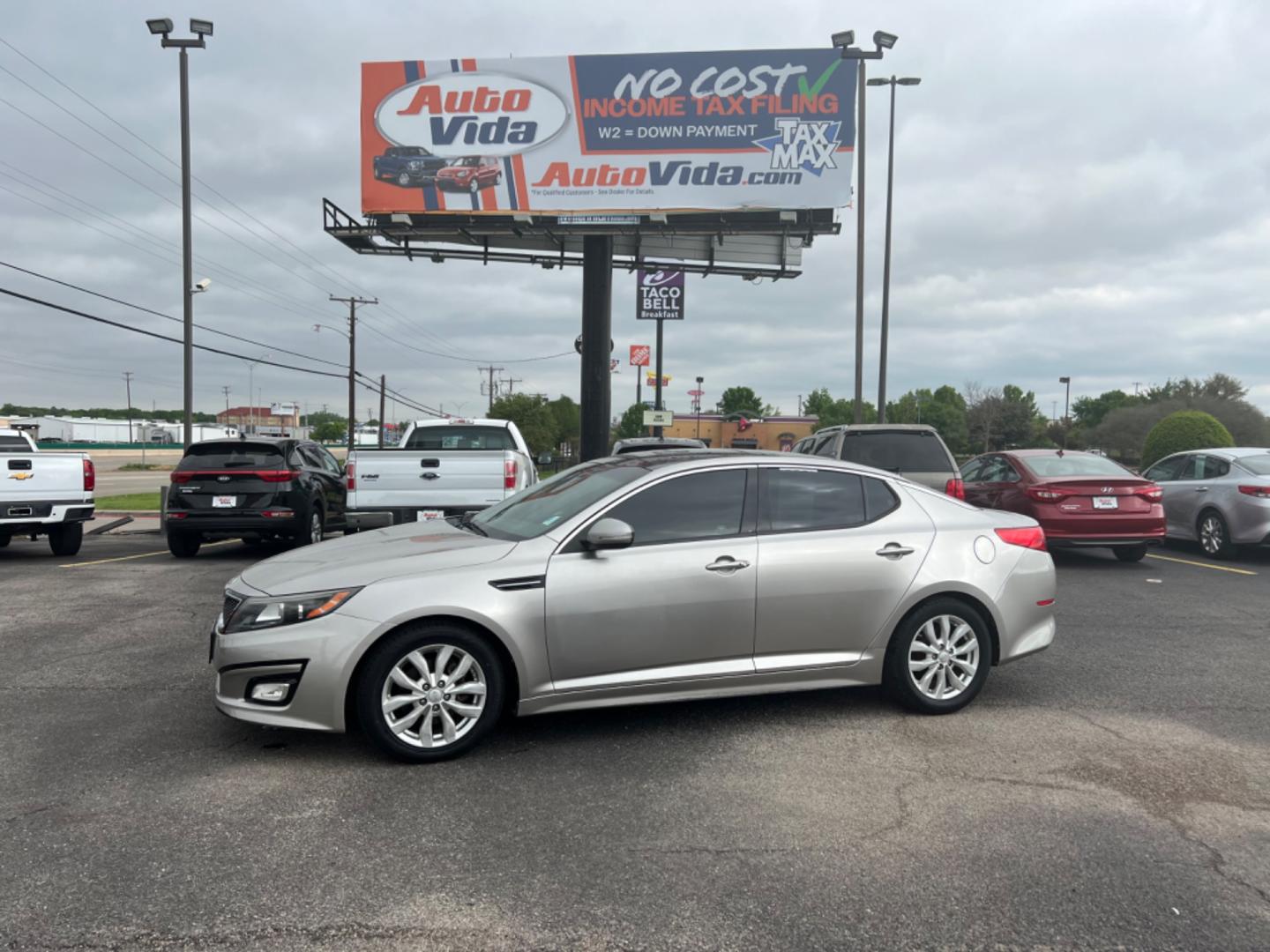 2014 SILVER Kia Optima EX (5XXGN4A72EG) with an 2.4L L4 DOHC 16V engine, 6-Speed Automatic transmission, located at 420 I-35E, Lancaster, TX, 75146, (469) 297-4144, 32.593929, -96.823685 - Photo#0